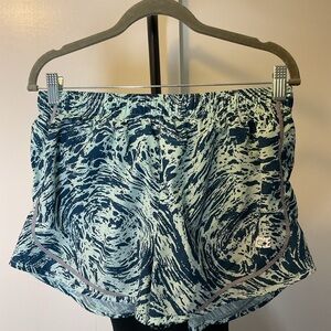 19. Nike Blue and White Athletic Shorts with Swirling Pattern Size Large